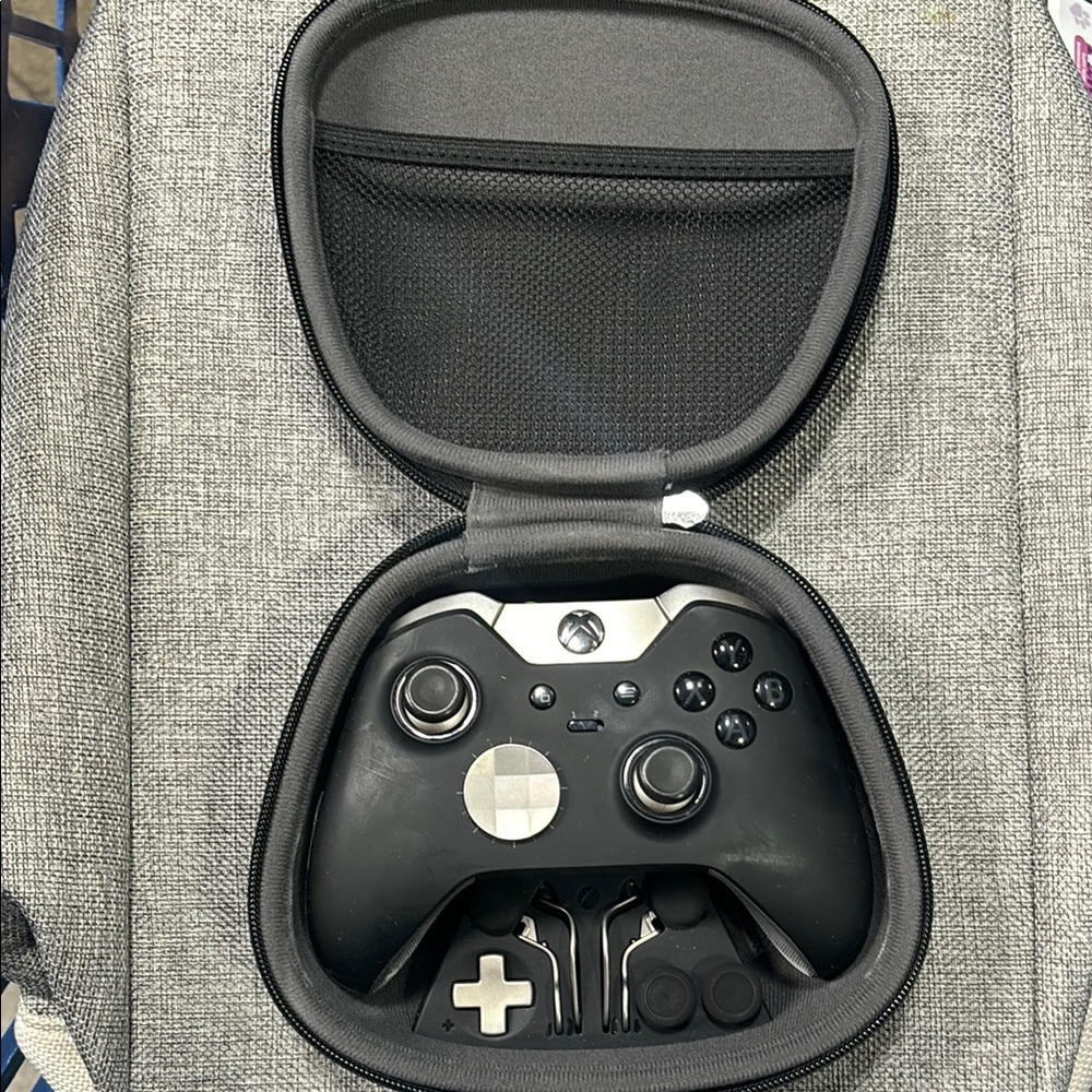 Black microsoft elite Xbox Controller with Case and accessories
